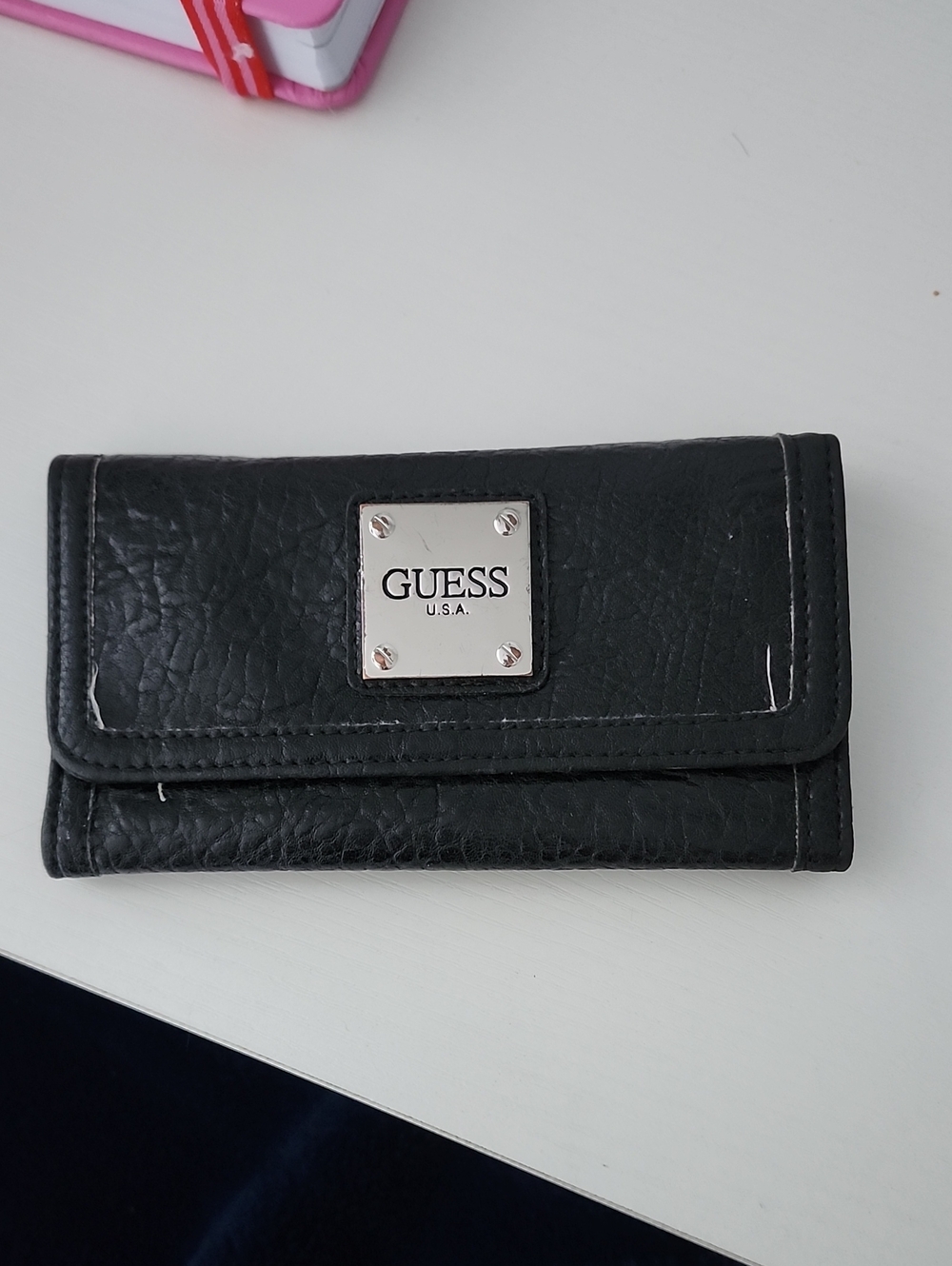 GUESS Black Trifold Wallet with Silver Logo Plate